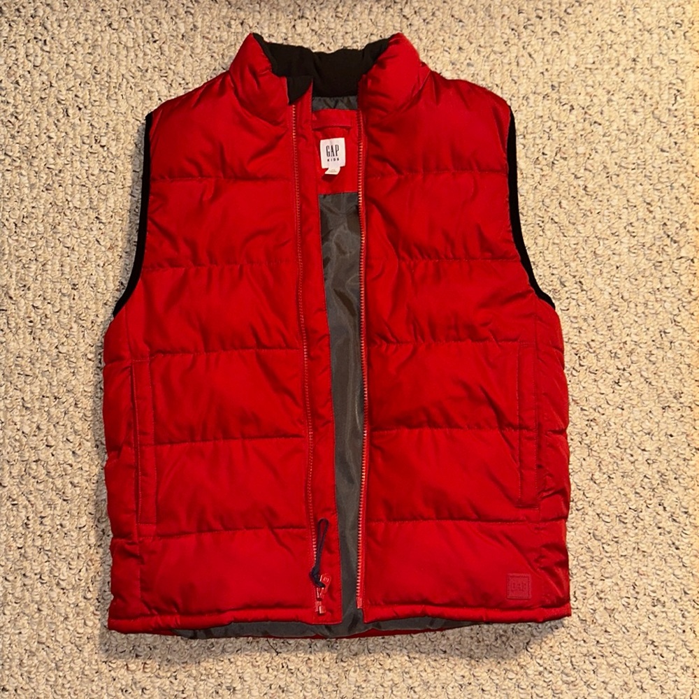 COPY - Boys red puffer vest. It is from the brand GAP